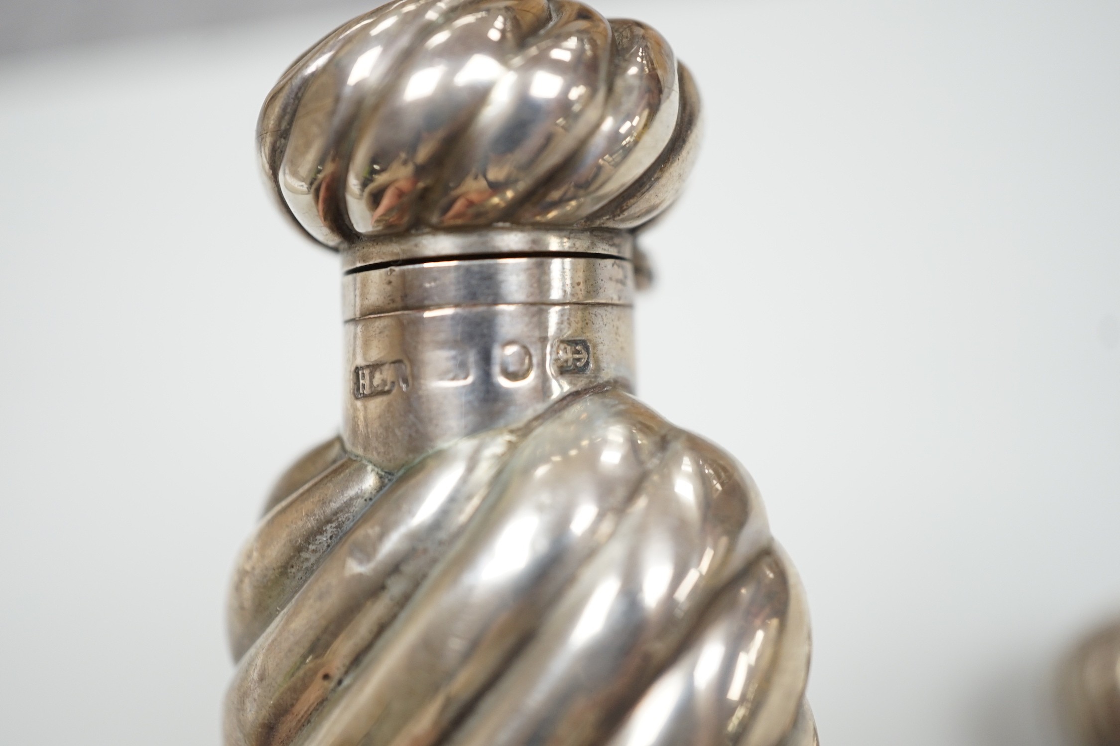 Two late Victorian silver teardrop shaped scent bottles, the largest by Horton & Allday, 15.6cm.